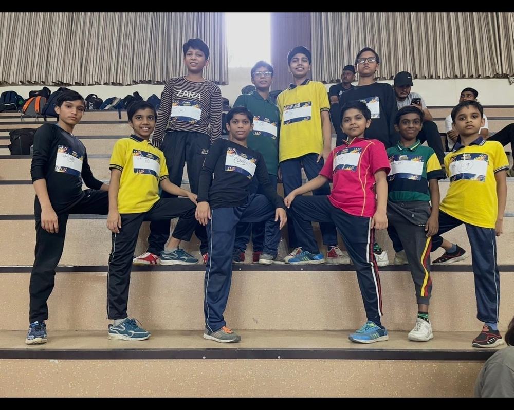 Boys from Shiv Karmsthali at a school sports meet, wearing event bibs