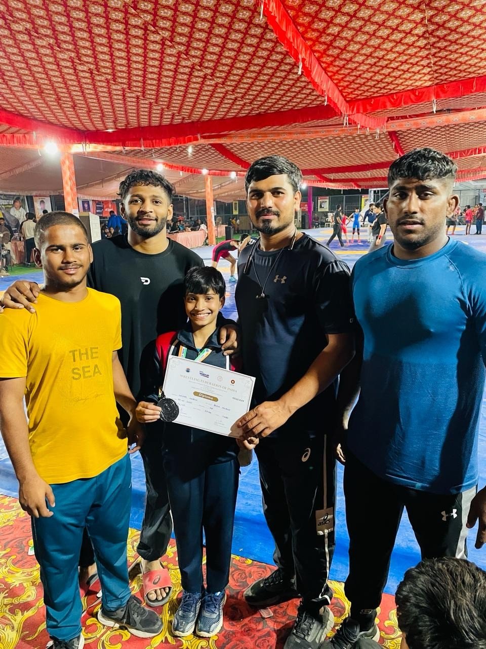 Newspaper feature on the trust's wrestling achievements