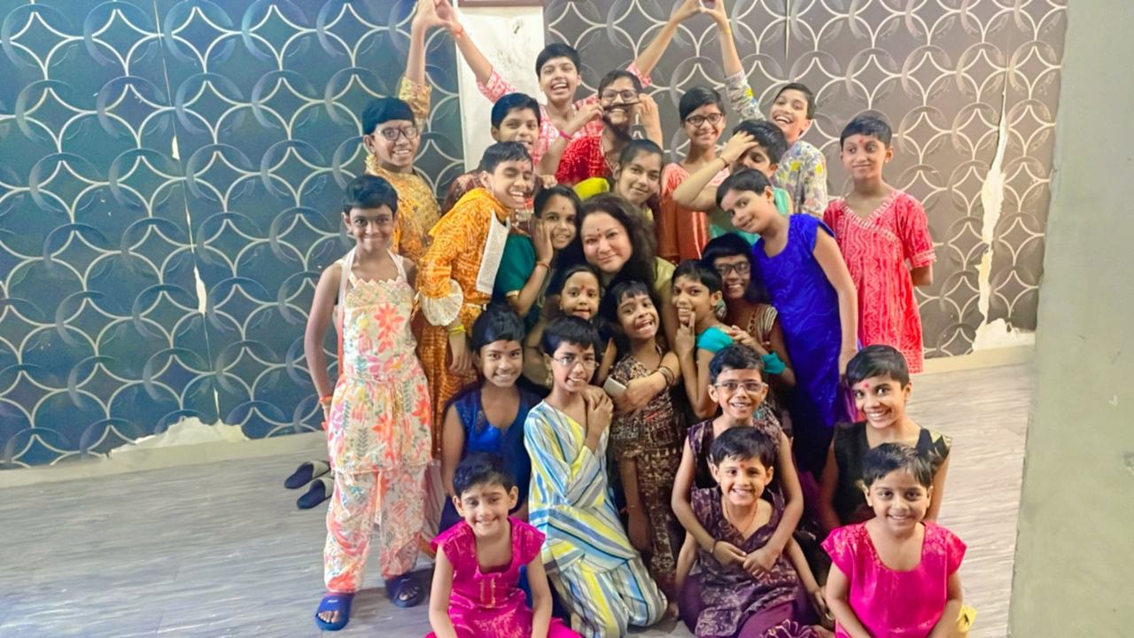 Mixed group in colourful cultural costumes