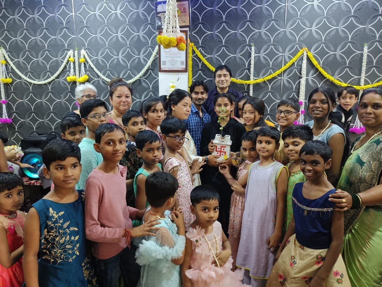 Group of children in festive attire indoors