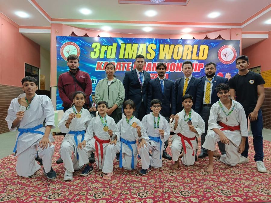 Shiv Karmsthali's karate team with medals at the 3rd IMAS World Karate Championship